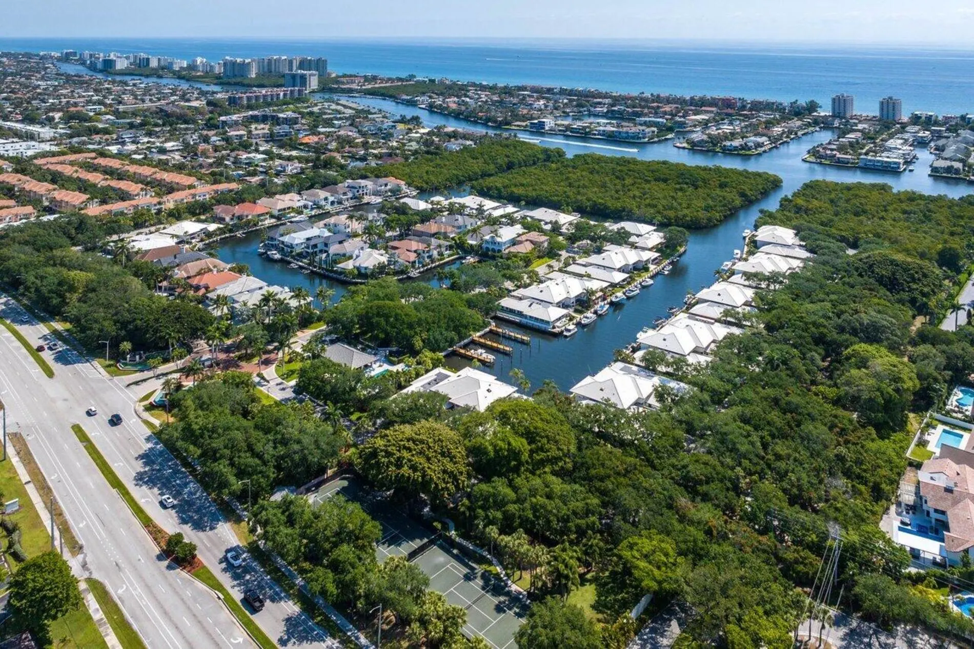 Aerial view of the waterfront homes in Boca Marina & Yacht Club in Boca Raton, Florida